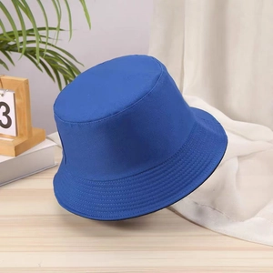 Detail shot of the cotton fabric texture on a blue minimalist reversible bucket hat
