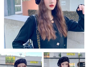 Detail of a chic black beret with sparkling sequins paired with a knitted cardigan