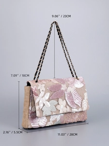 Detailed size guide of woven shoulder bag with floral embroidery and chain strap