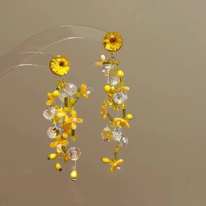Floral tassel drop earrings with yellow beads and clear crystals in forest style