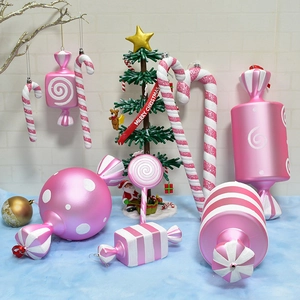 Pink and white Christmas candy cane ornaments set with glitter finish for festive decor