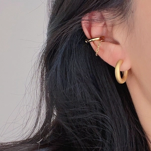 Matte gold thick hoop earrings with matching chain ear cuff for women in 18k gold plated steel