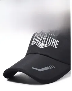 Detail of Adventure 2025 embroidery on black breathable mesh visor sun hat