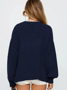 Oversized navy blue knitted sweater for women with loose fit and long sleeves back view