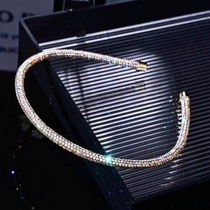 Elegant thin metal headband with sparkling multi-color rhinestones and golden end caps