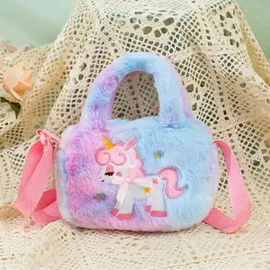 Detail of colorful plush unicorn bag showing soft gradient fur and embroidery