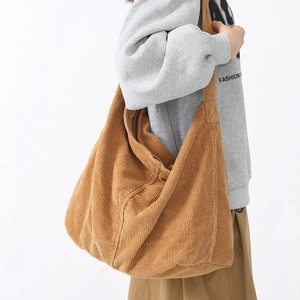 Brown corduroy crossbody tote bag for women showing a large capacity soft shoulder strap