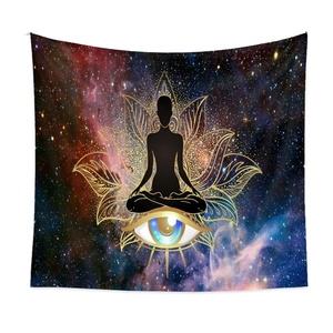 Detail of a meditation tapestry with a golden lotus, galaxy nebula, and a zen silhouette