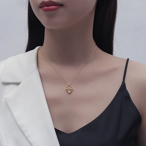Elegant gold S925 sterling silver heart necklace with MOM pendant on female model