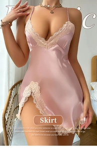 Detail of pink satin nightgown featuring delicate lace trim and high side slit