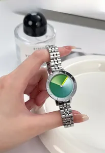 Detailed shot of creative silver steel watch with artistic tricolor gradient dial