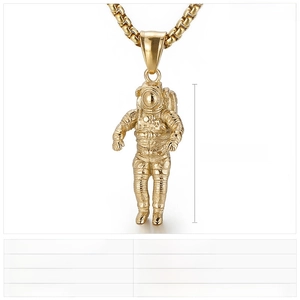 Detailed view of a gold-plated astronaut pendant with specific 36x16mm size dimensions