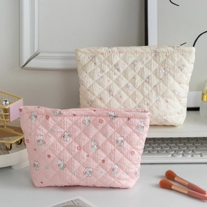Trousse de maquillage matelassée à motif lapin rose pour voyage et rangement