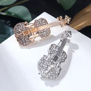 Squisite spille a violino con cristalli incastonati in finiture oro e argento