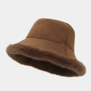 Winter plush bucket hat in brown suede and faux fur trim for warm outdoor fashion