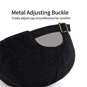 Black casual flat cap with adjustable metal buckle and textured fabric for a comfortable fit