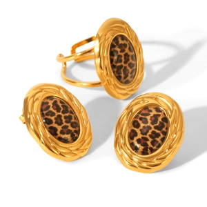 Golden stainless steel jewelry set with oval leopard print pattern and twisted edges