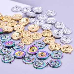 Titanium steel Evil Eye pendants in gold, silver, and rainbow colors with radial engravings