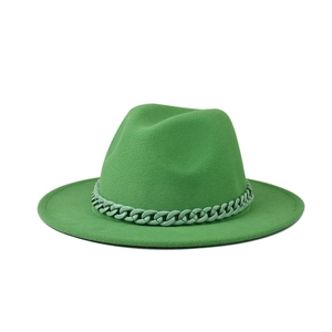 Detail of green fedora hat with matching green plastic chain band on smooth wool felt