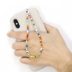 Bijou de téléphone bohème en perles d'argile colorées avec charms mauvais œil