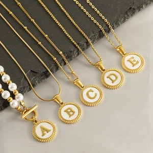 Gold 18K stainless steel initial pendants with white shell inlay on diverse chain styles