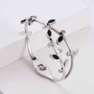 Silver-toned double-layered leaf bangle with black enamel and crystal accents