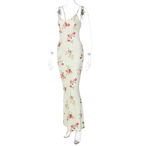 Detailed view of long mint green floral dress with slim fit and spaghetti straps