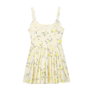 Floral print spaghetti strap mini dress in soft yellow with fitted waist and flared hem