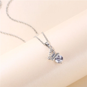 Elegant hollow butterfly pendant necklace with sparkling cubic zirconia on silver chain