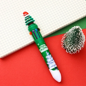 Detail of 10-color Christmas ballpoint pen featuring a green barrel and 3D Xmas tree topper