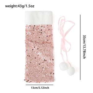 Pink sequin Christmas wine bottle cover with fur trim and sizing measurements 13x35cm
