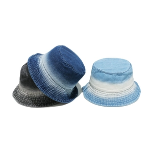 Striped gradient washed denim bucket hats in navy, light blue, and grey for women