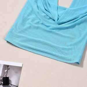 Detailed close-up of sky blue mesh fabric with breathable micro-hole texture on two-piece set