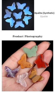 Macro detail of various colorful butterfly-shaped natural stone pendants for DIY jewelry