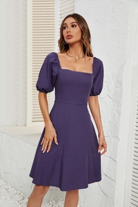 Close-up of square neckline and puff sleeves on a deep purple slim fit midi dress