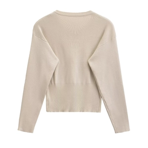 Beige knit round neck cardigan with long sleeves and ribbed texture for autumn style