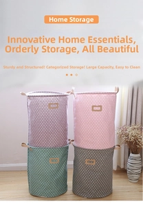 Close-up of four colorful polka dot cotton linen laundry baskets with durable handles