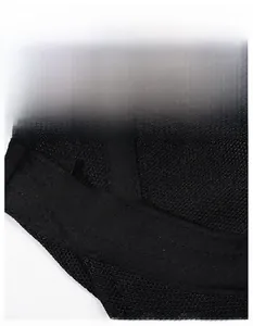Detail view of the breathable mesh fabric and wide sweatband on the black mesh hat