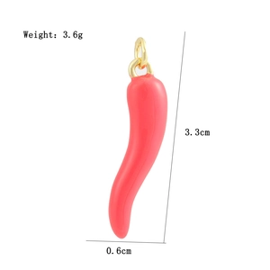 Detail of red chili pepper pendant showing 3.3cm height and 0.6cm width dimensions