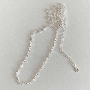 Minimalist 925 sterling silver mariner link necklace with S925 tag on grey background