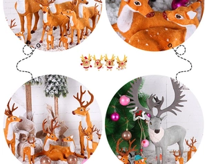 Detailed view of festive reindeer figurines in brown and gray with soft flocked texture