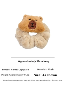 Detail showing a soft plush Capybara scrunchie with 10cm length and 11.9g weight