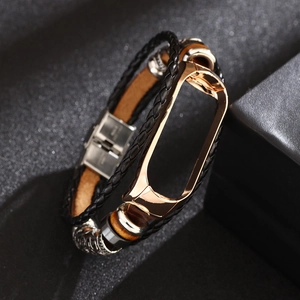 Detail of ethnic leather strap with rose gold metal frame and S925 silver buckle