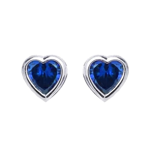 Detailed macro view of heart-shaped blue zircon stud earrings in silver-tone setting