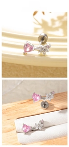 Detailed view of copper flower stud earring with pink heart zircon and silver post