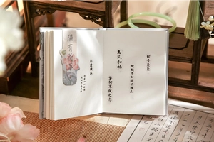 Detail of A7 notebook set with lotus bookmark in an elegant traditional Chinese setting
