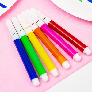 Set of 6 mini colorful watercolor pens for drawing and coloring on pink paper