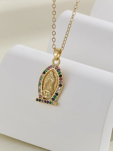 Detailed close-up of Virgin Mary pendant with colorful pavé cubic zirconia on gold chain