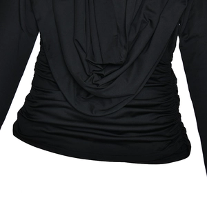 Detail of the open back with elegant draped fabric and side pleats on black long sleeve top