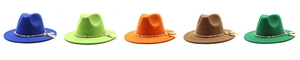 Detail of wool jazz hats in multiple colors with metal chain and tassel decoration